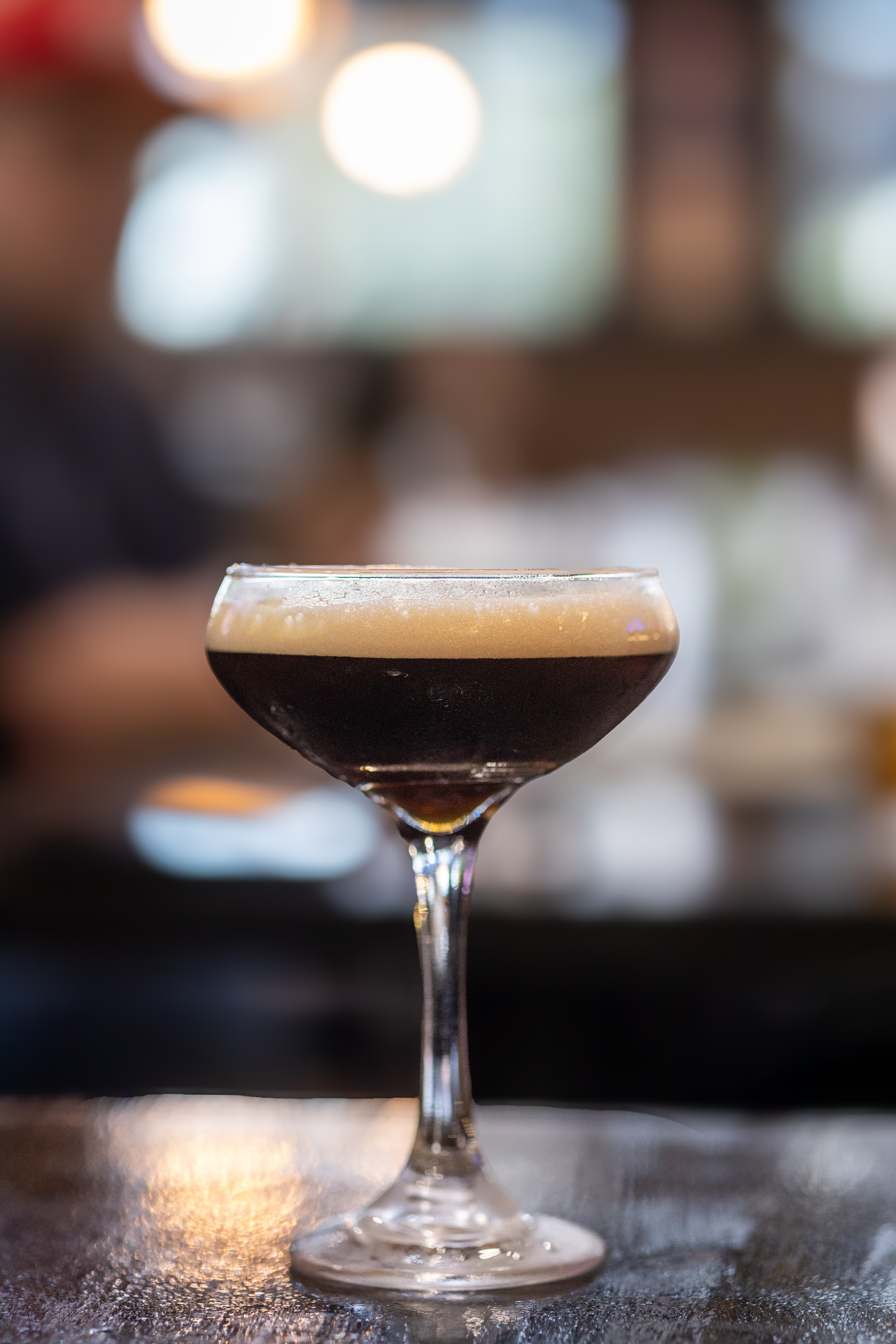 Espresso martini with espresso beans at The Owner's Box bar