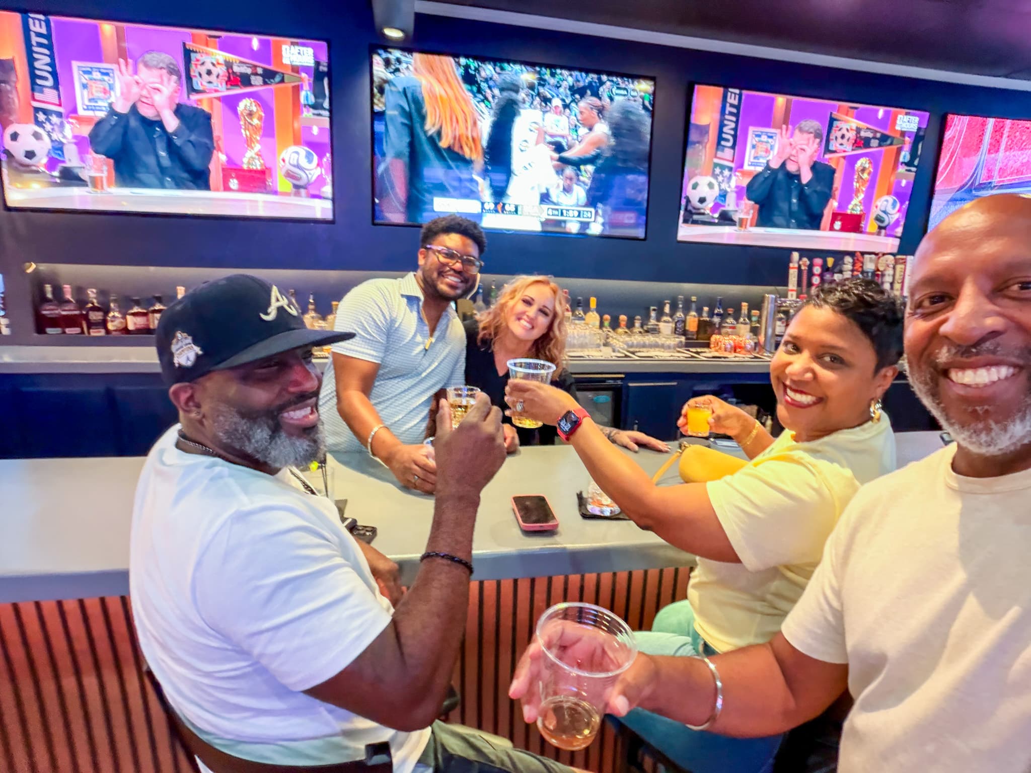 Friends enjoying a late night at the bar