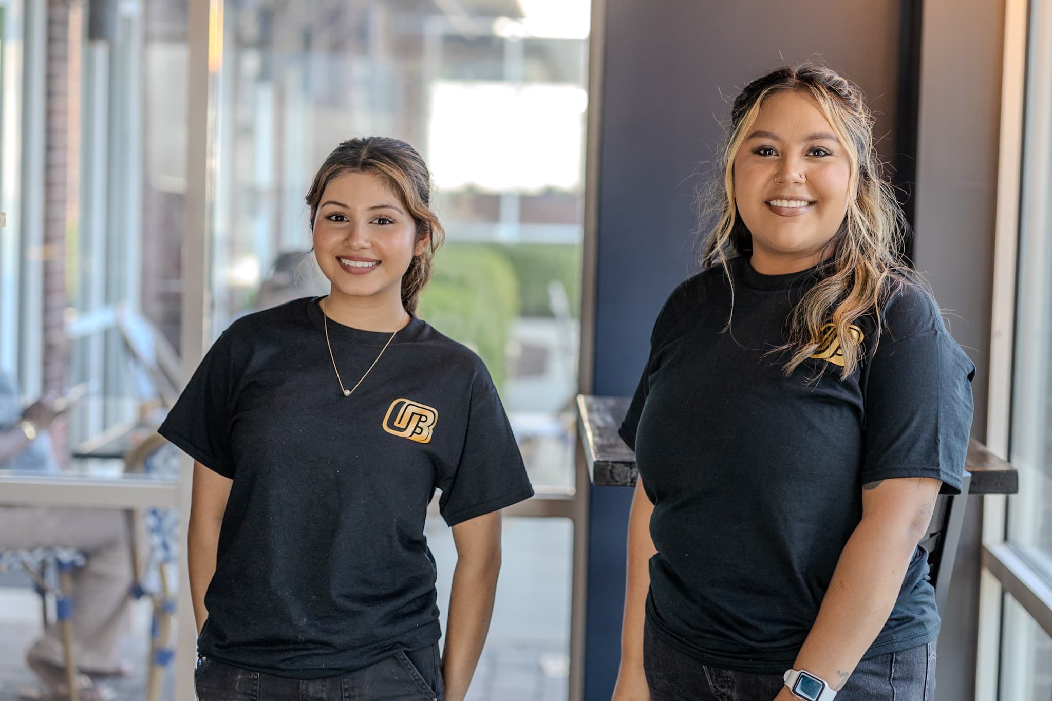 The Owner's Box staff welcoming guests